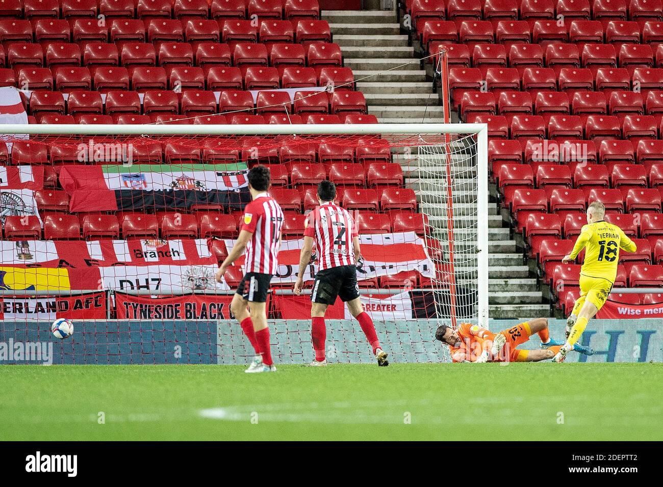 SUNDERLAND, ENGLAND. DECEMBER 1ST Charles Vernam scores after Sunderland  keeper Remi Matthews spins the ball during the Sky Bet League 1 match  between Sunderland and Burton Albion at the Stadium Of Light,