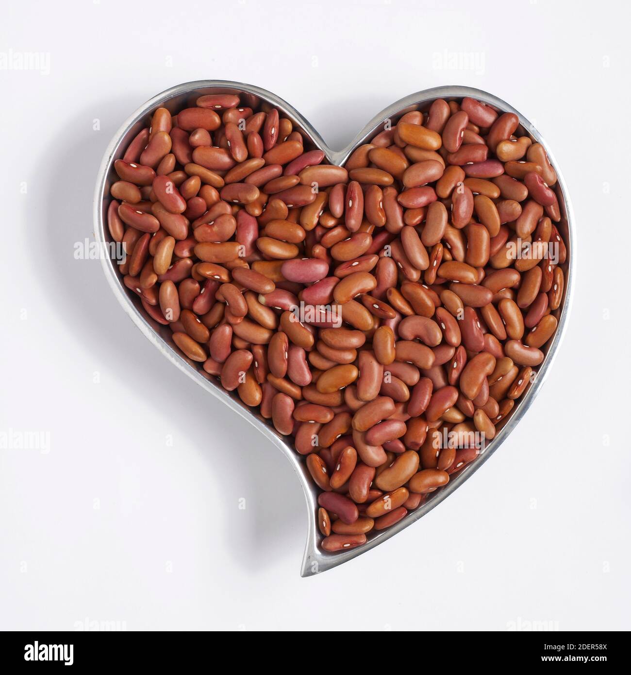 kidney beans in heart-shaped container Stock Photo