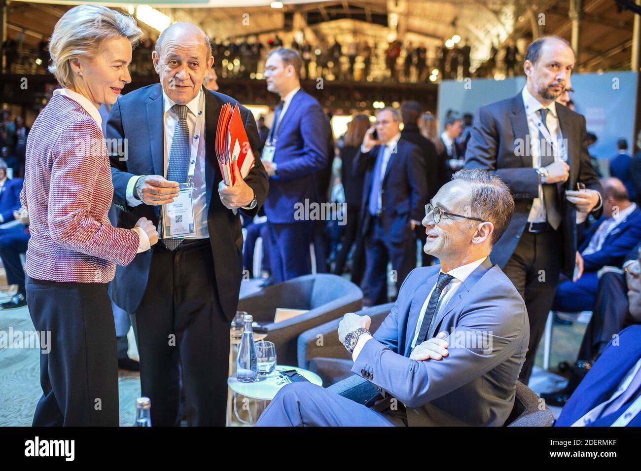 European Commission president Ursula von der Leyen (L) listens to French Foreign Minister Jean-Yves le Drian (C) while German Foreign Minister Heiko Maas (R) looks on at the start of the Paris Peace Forum, on November 12, 2019 in Paris, France. Photo by Eliot Blondet/ABACAPRESS.COM Stock Photo