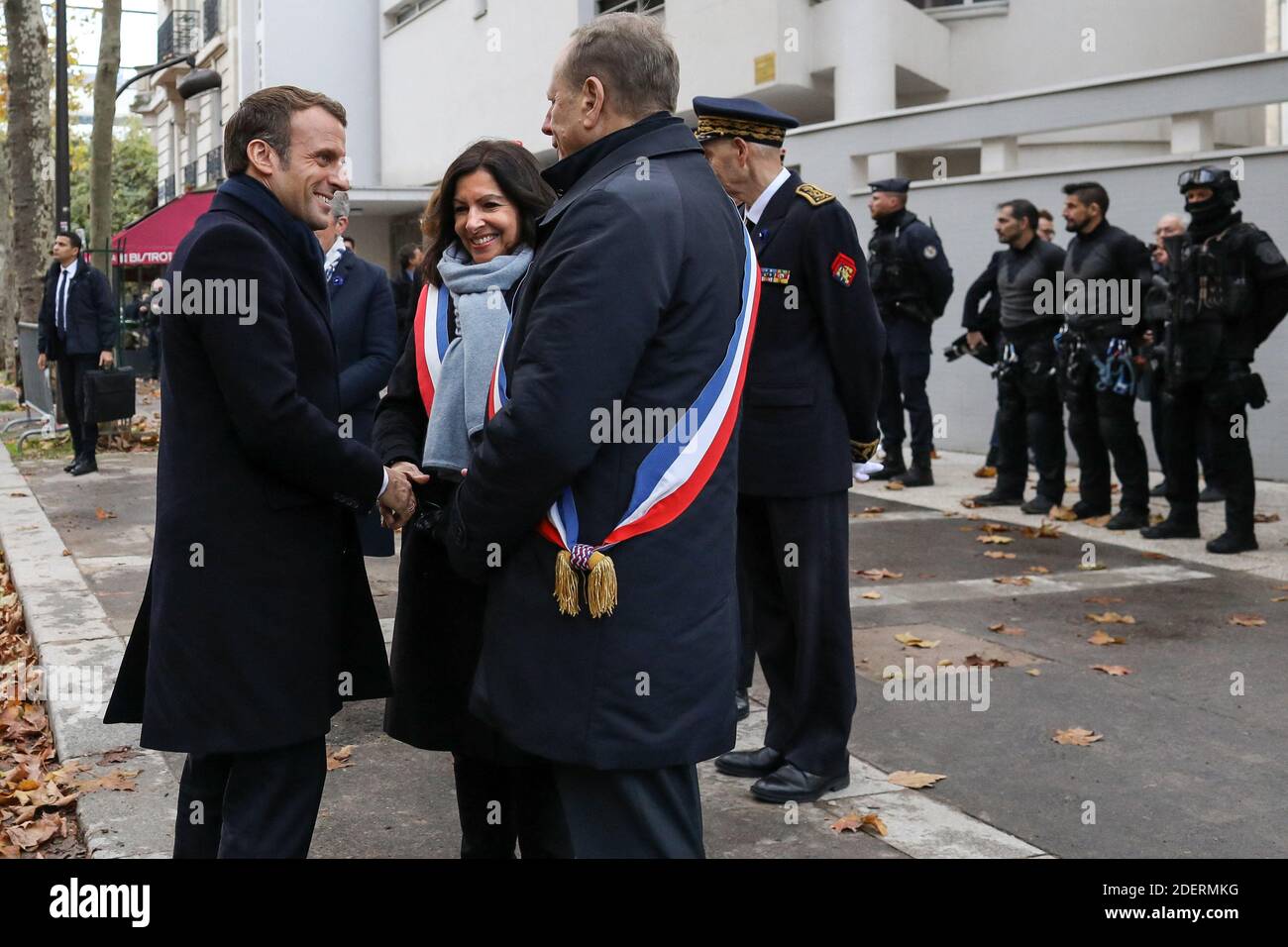 French President Emmanuel Macron, Paris' mayor Anne Hidalgo and Mayor of the 15th arrondissement Philippe Goujon at official inauguration of the 'Monument aux morts pour la France en operations exterieures' (OPEX) by French artist Stephane Vigny on November 11, 2019 in the Eugenie-Djendi garden in Paris, France, as part of commemorations marking the 101st anniversary of the 11 November 1918 armistice, ending World War I. Photo by Stephane Lemouton/Pool/ABACAPRESS.COM Stock Photo