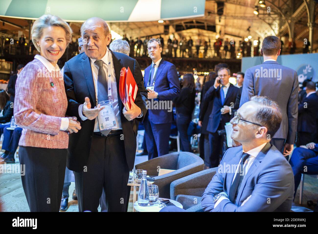 European Commission president Ursula von der Leyen (L) listens to French Foreign Minister Jean-Yves le Drian (C) while German Foreign Minister Heiko Maas (R) looks on at the start of the Paris Peace Forum, on November 12, 2019 in Paris, France. Photo by Eliot Blondet/ABACAPRESS.COM Stock Photo