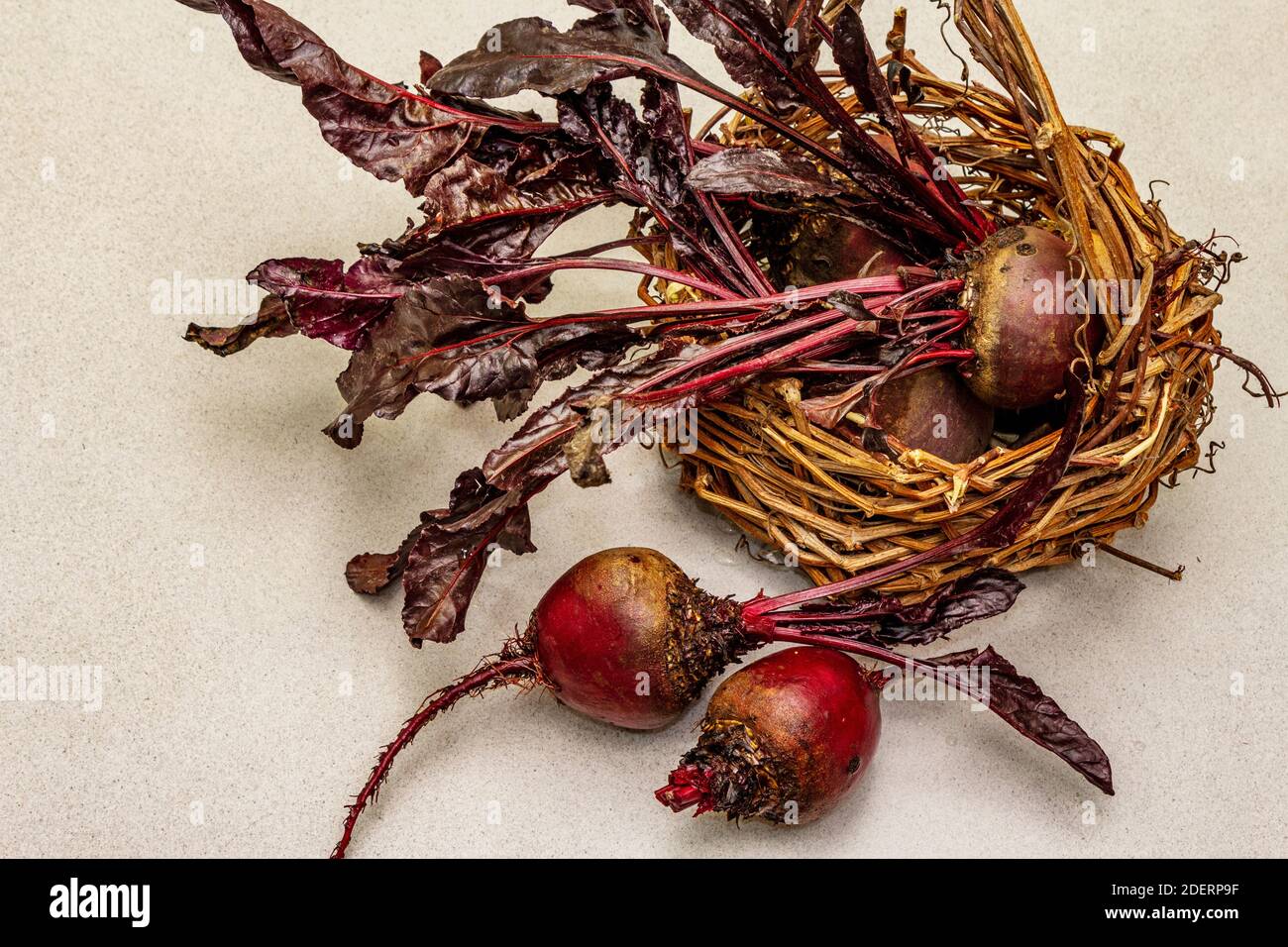 Fresh homegrown beetroot with leaves in wicker basket. Healthy plant ...