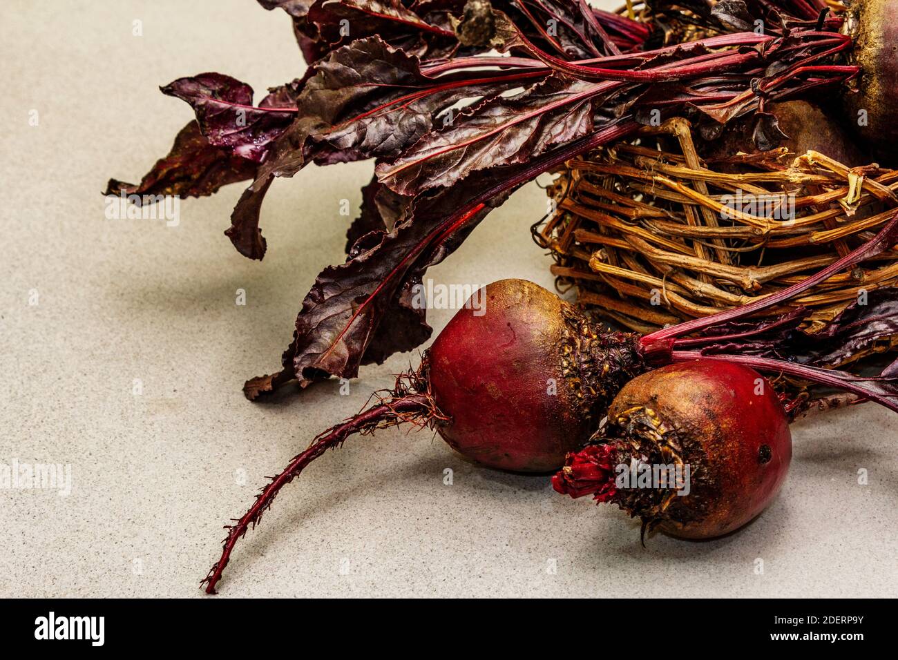 Fresh homegrown beetroot with leaves in wicker basket. Healthy plant ...