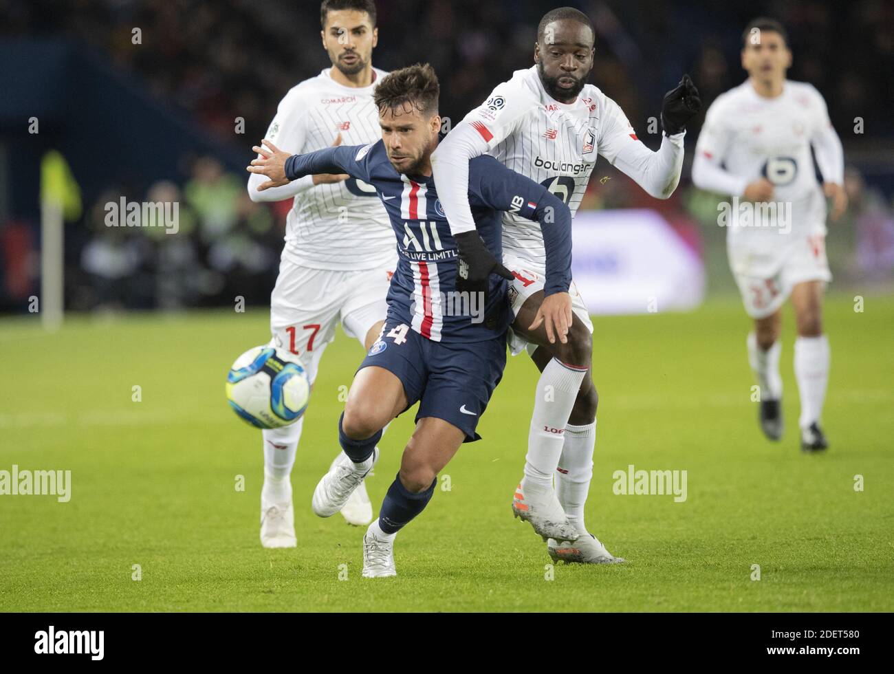 Juan Bernat Velasco of PSG and Nanitamo Ikone of LOSC during the Ligue ...