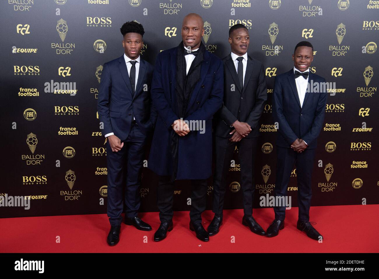 Former Ivorian striker Didier Drogba, host of the Ballon d Or ceremony, and  sons arrive to attend the Ballon d Or France Football 2019 ceremony at the  Chatelet Theatre on December 2,