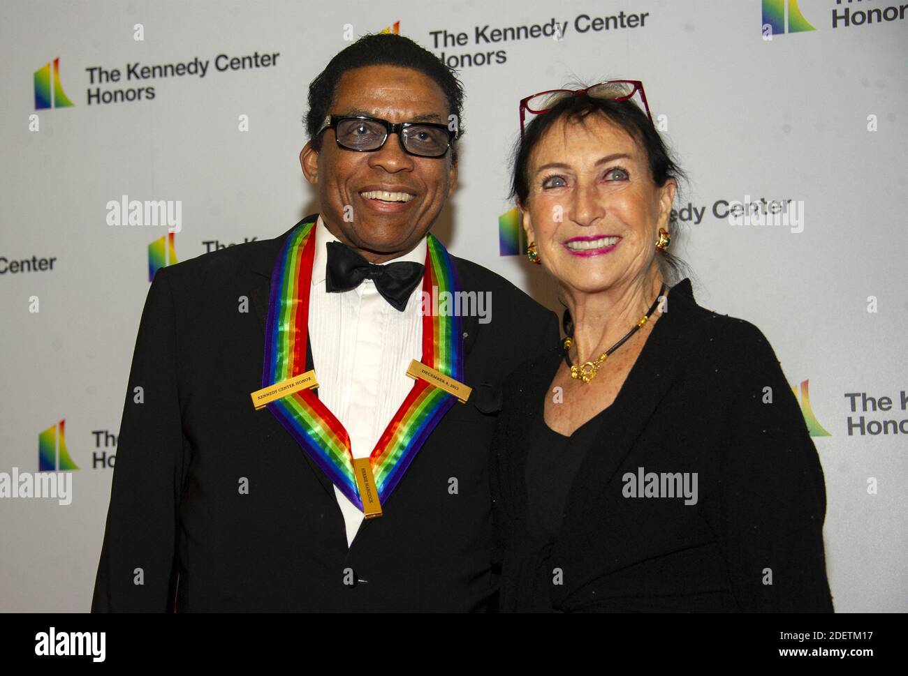 Herbie Hancock and his wife, Gigi, arrive for the formal Artist's