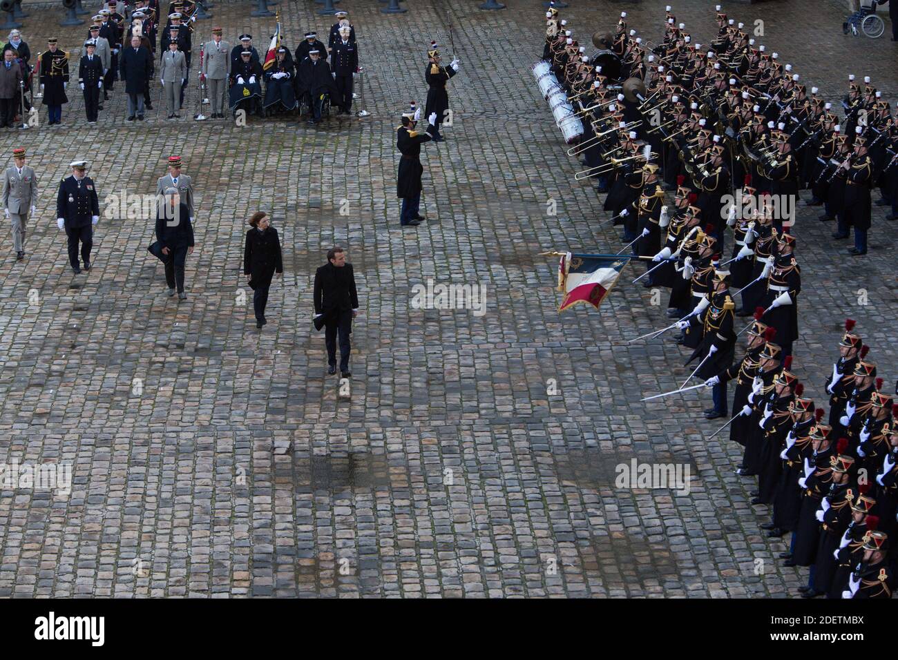 French President Emmanuel Macron followed by minister of army Florence ...