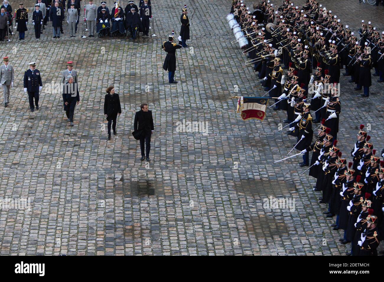 French President Emmanuel Macron followed by minister of army Florence ...