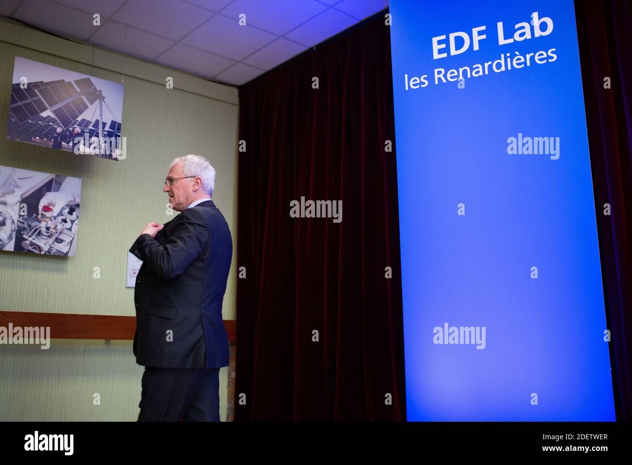 CEO of EDF Jean-Bernard Levy under EDF lab logo as he visits of the EDF ...