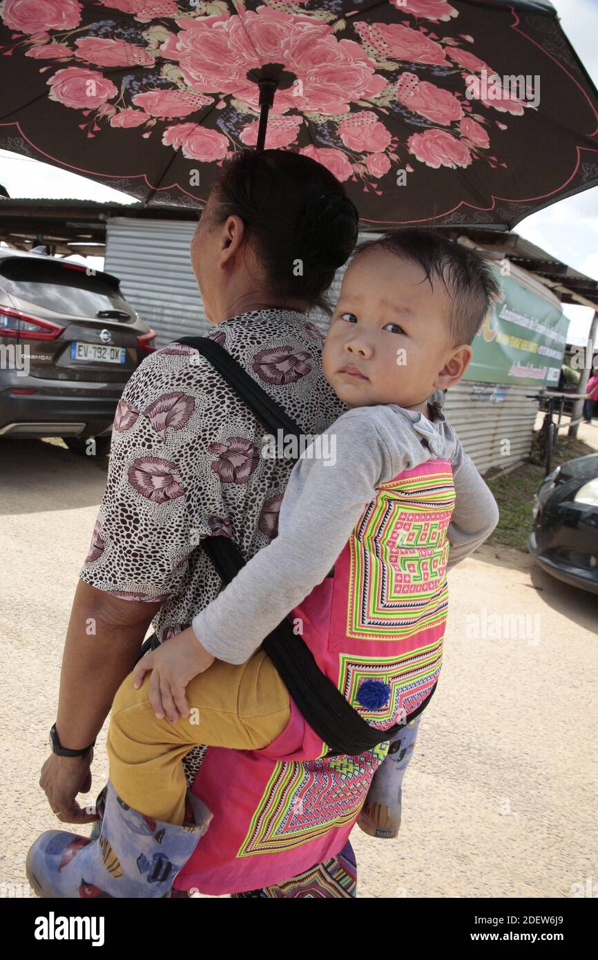 JAVOUHEY, FRENCH GUYANA -NOVEMBER 13: Daily life of Hmongs refugees on November 13, 2019 in Javouhey, French Guiana.The Hmong are a Southeast Asian people from the mountains that have been persecuted for 40 years by Laos and Vietnam gouvernements. It was the Vietnam war that broken their isolation. After having fought for their freedom with the French Army in 1950 and American in 1970 many Hmongs are today refugees in French Guyana and in the USA.(Photo by Patrick Aventurier/ABACAPRESS.COM) Stock Photo