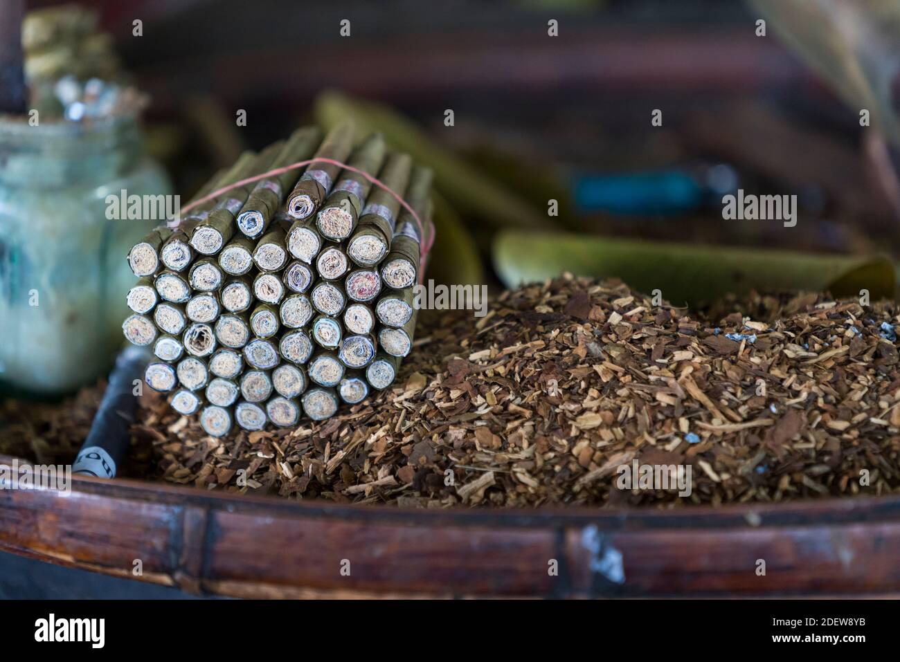 Detail of bundle of Burmese cigars and tobbacco inside cheroot cigar making workshop, Lake Inle, Myanmar Stock Photo