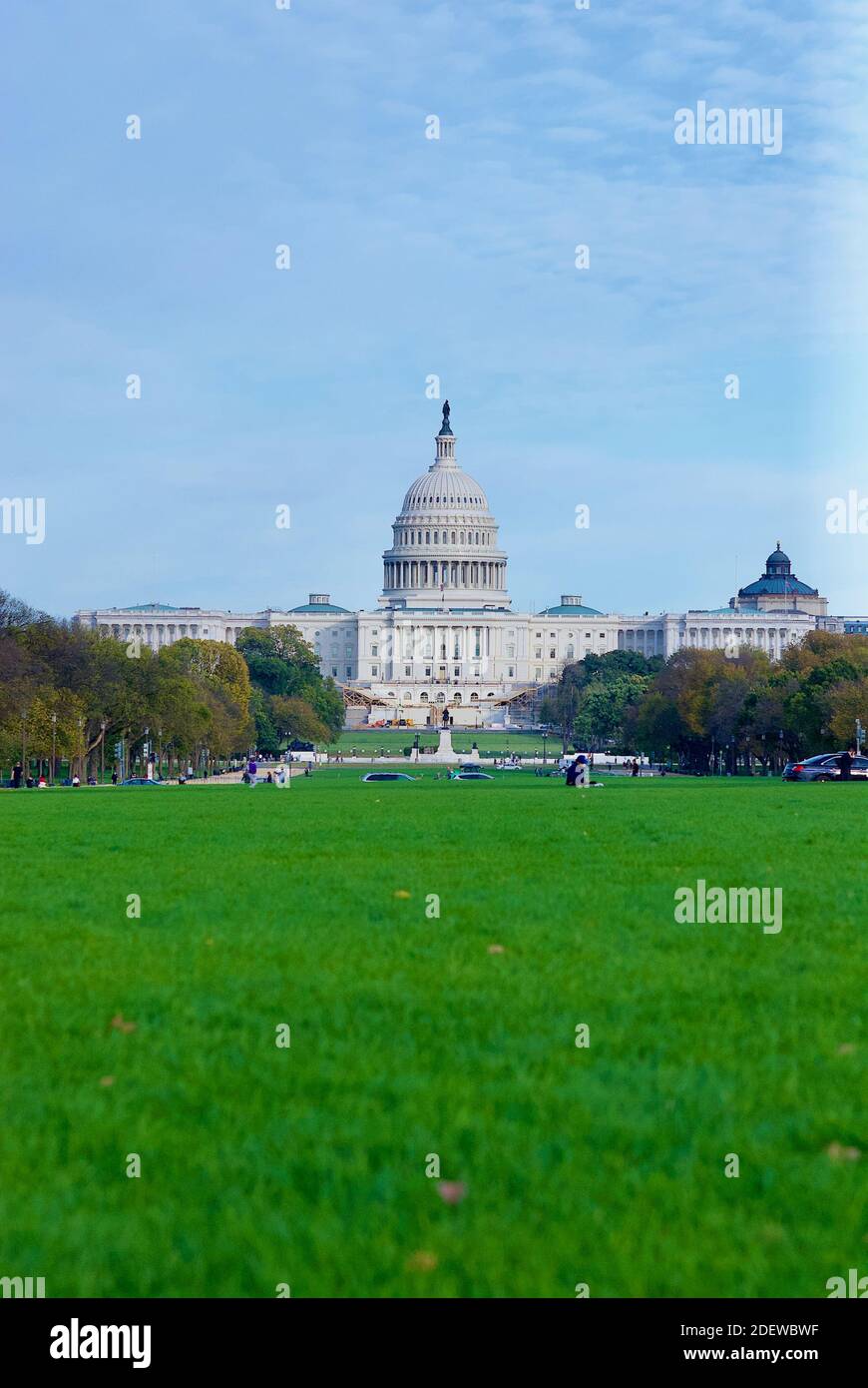 Washington, D.C. - November 3, 2020: Tourists enjoy an autumn afternoon on the National Mall with the United States Capitol building in the background. Stock Photo