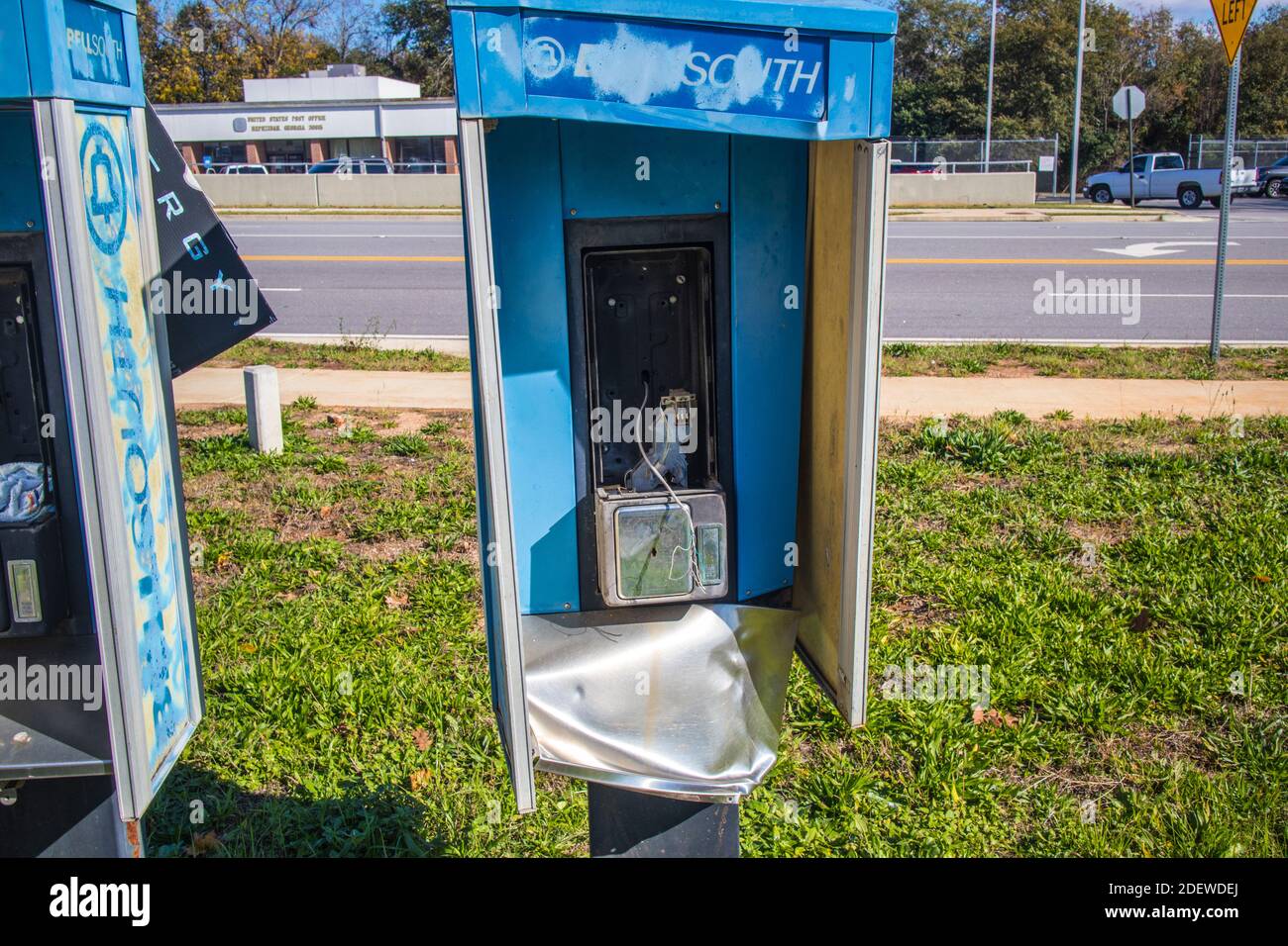 Hephzibah, Ga USA - 12 01 20: Old payphone booth with the phone missing vintage trash close up Stock Photo