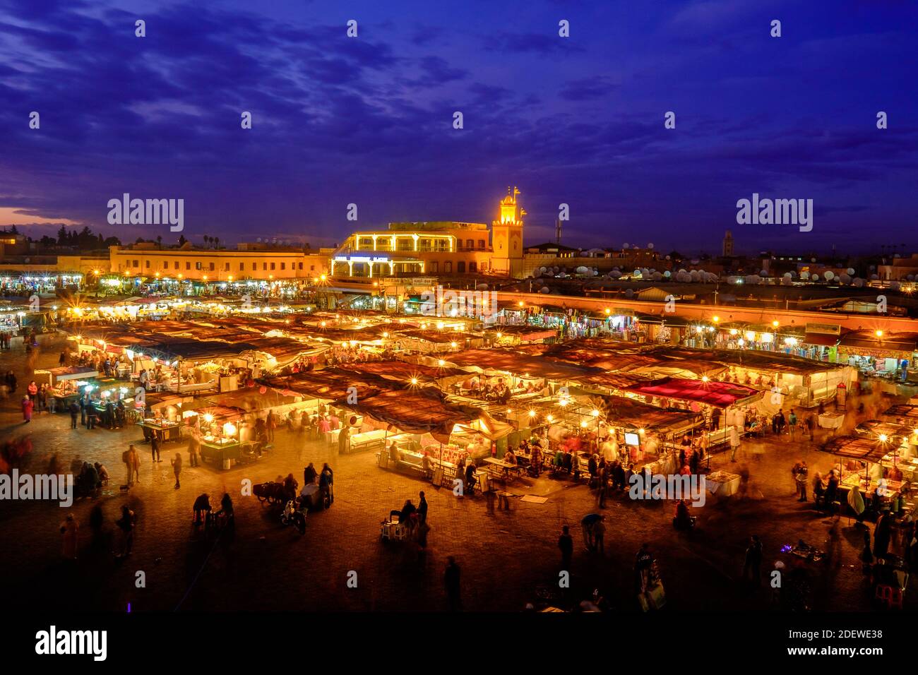 Jemaa El Fna markets during blue hours as food vendor set up their store. Marrakesh, Morocco Stock Photo