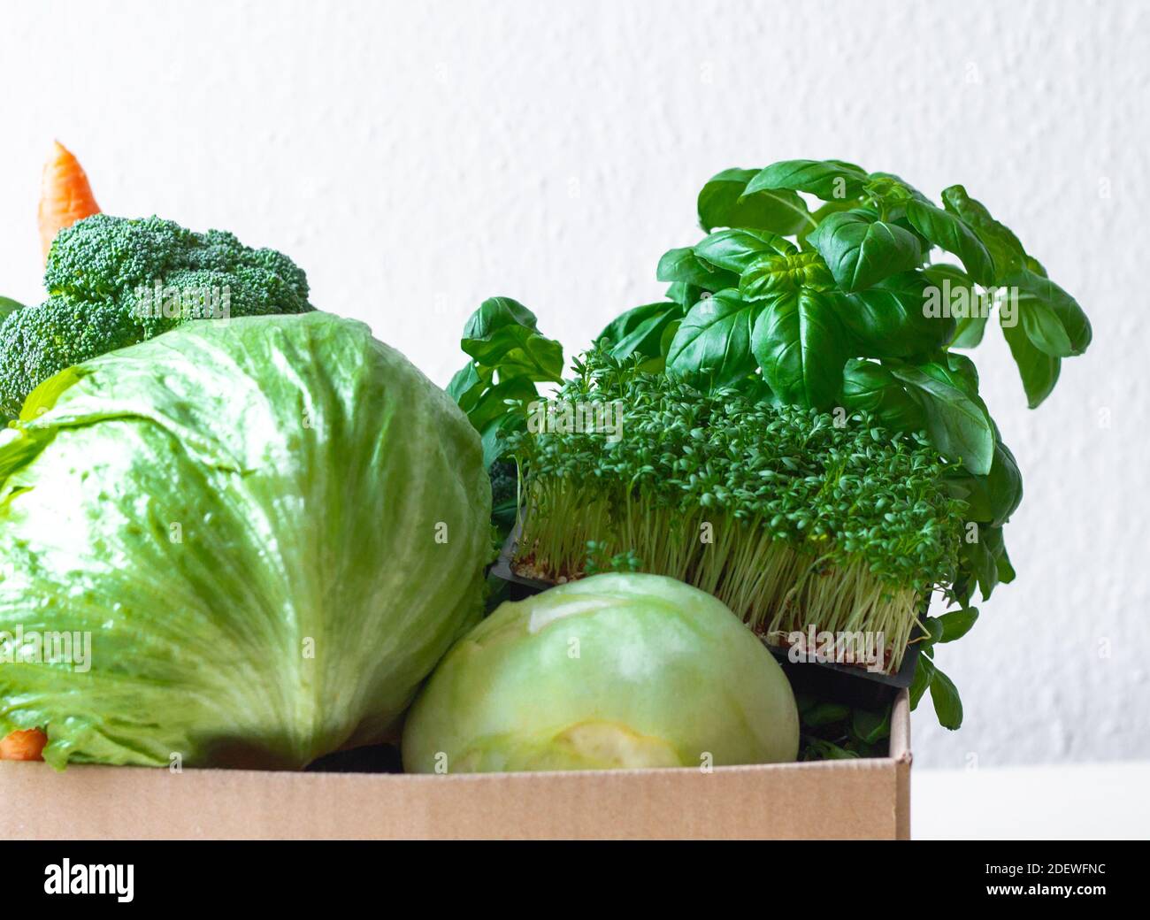green fresh vegetables on white background Stock Photo - Alamy