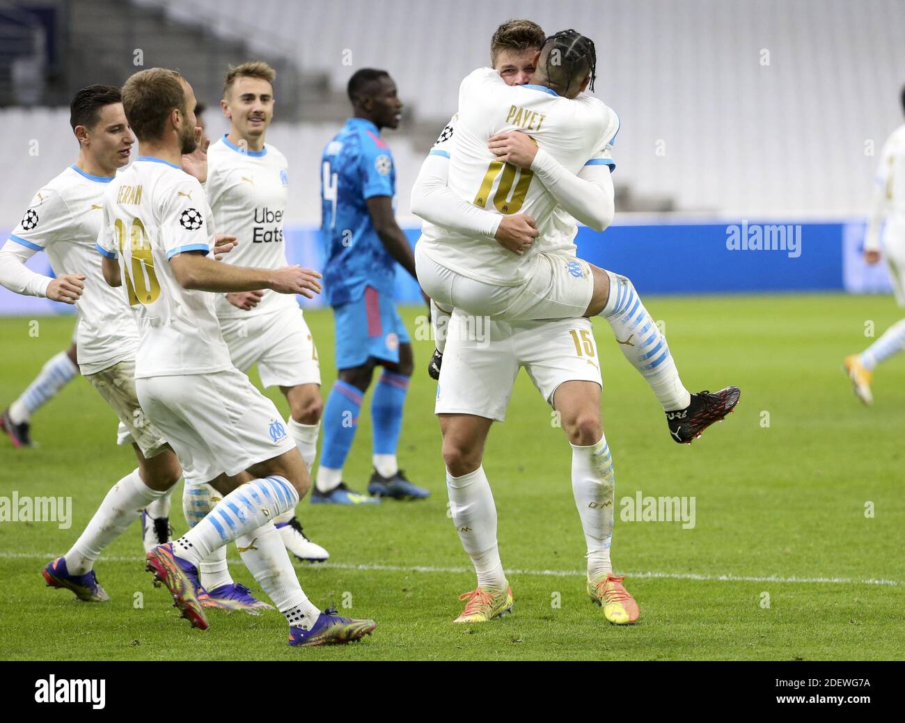 Dimitri Payet of Marseille celebrates his second goal on a penalty kick with Duje Caleta-Car and teammates during the UEFA Champ / LM Stock Photo