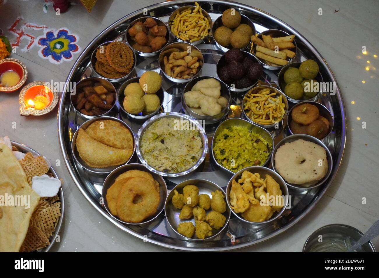 Mumbai / India 14 November 2020 Variety of Traditional Indian dishes on a thali and bowl served to Laxmi goddess as prasad during Diwali Puja Stock Photo