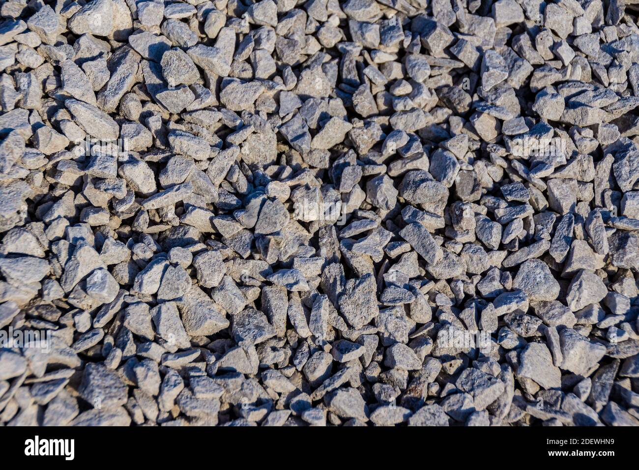 dolomite crushed stone even layer top view, selective focus Stock Photo