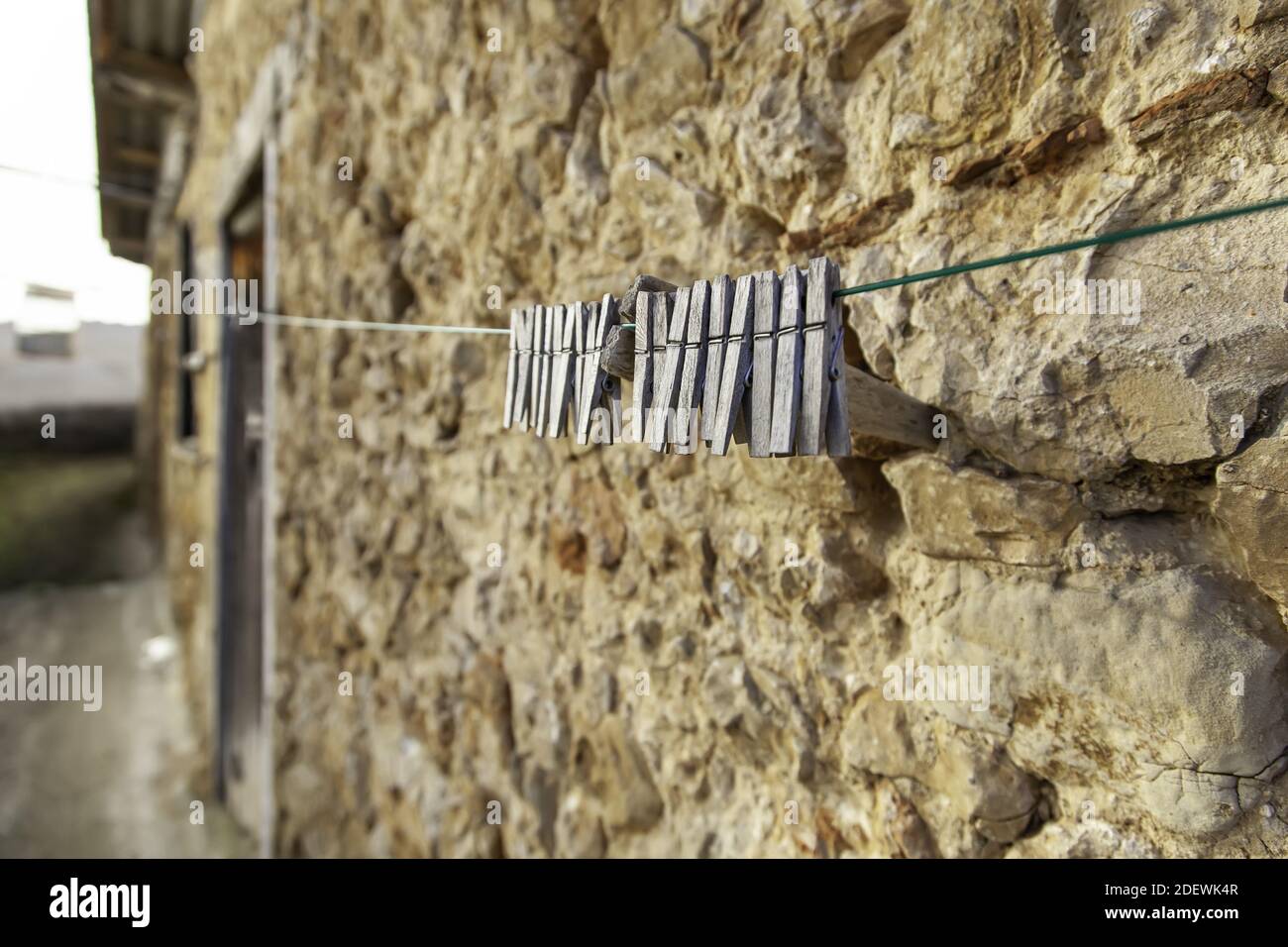 Detail of wooden objects to hang wet clothes Stock Photo Alamy