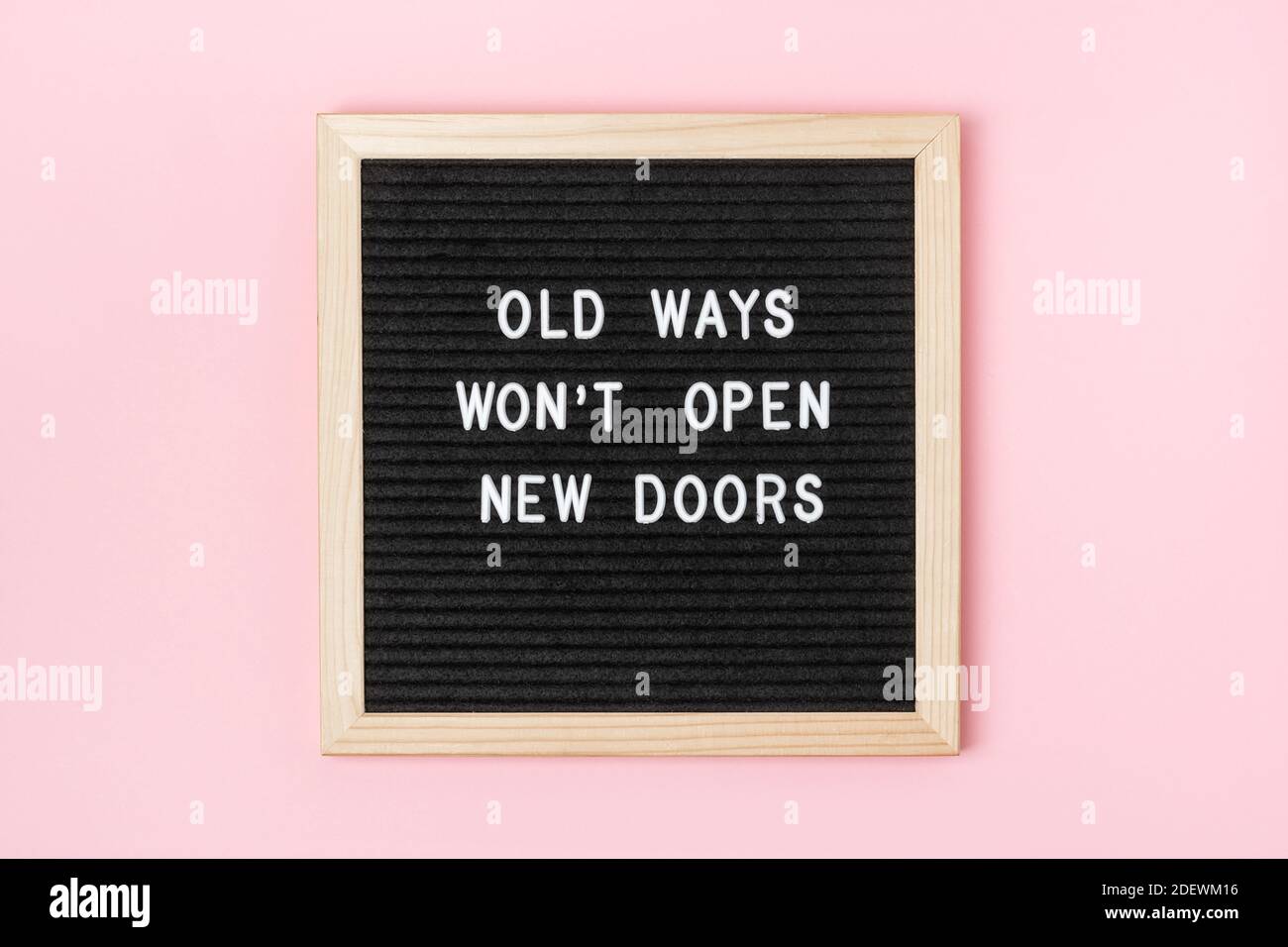 Old Ways Won T Open New Doors Motivational Quote On Black Letter Board On Pink Background Concept Inspirational Quote Of The Day Greeting Card Pos Stock Photo Alamy