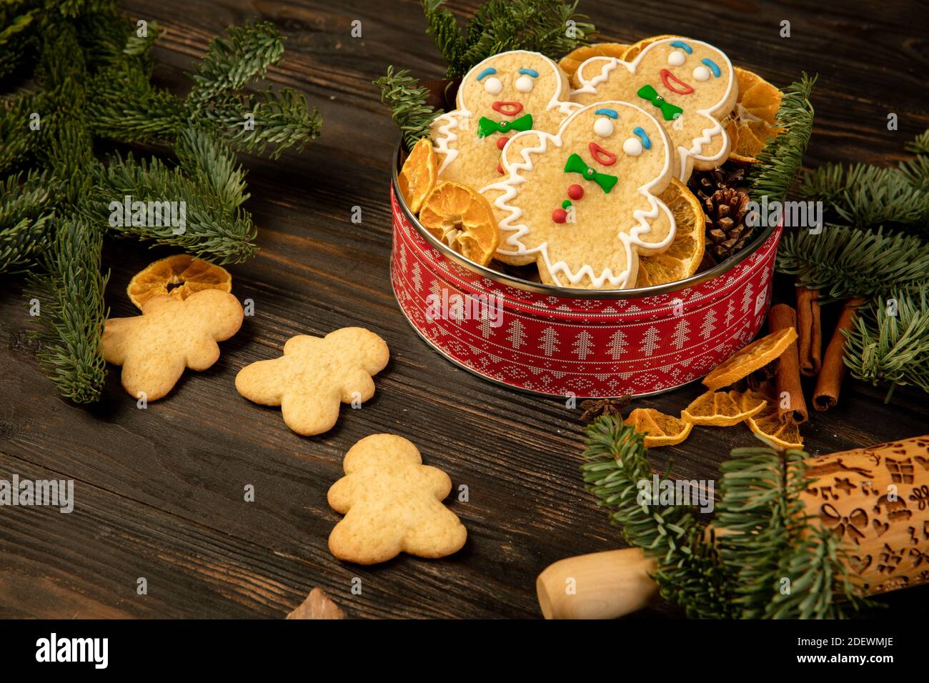 Close-up Christmas gift biscuit box with gingerbread men. Greeting card