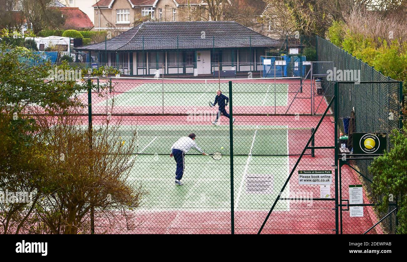 Brighton UK 2nd December 2020 - Tennis players back in action early this  morning at the Queens Park Tennis Club in Brighton as England goes back  into the coronavirus tier restrictions .