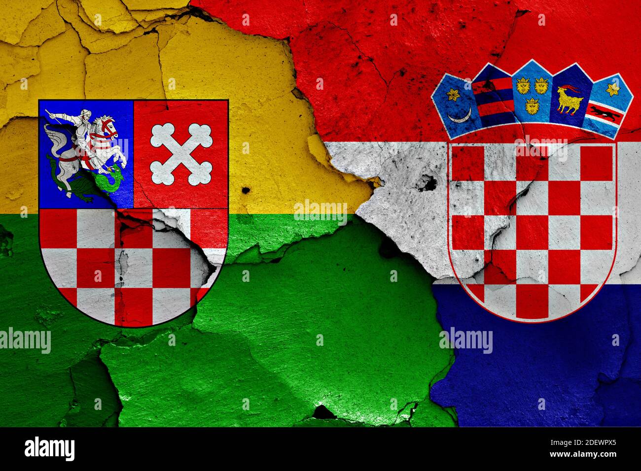 flags of Bjelovar-Bilogora County and Croatia painted on cracked wall Stock Photo