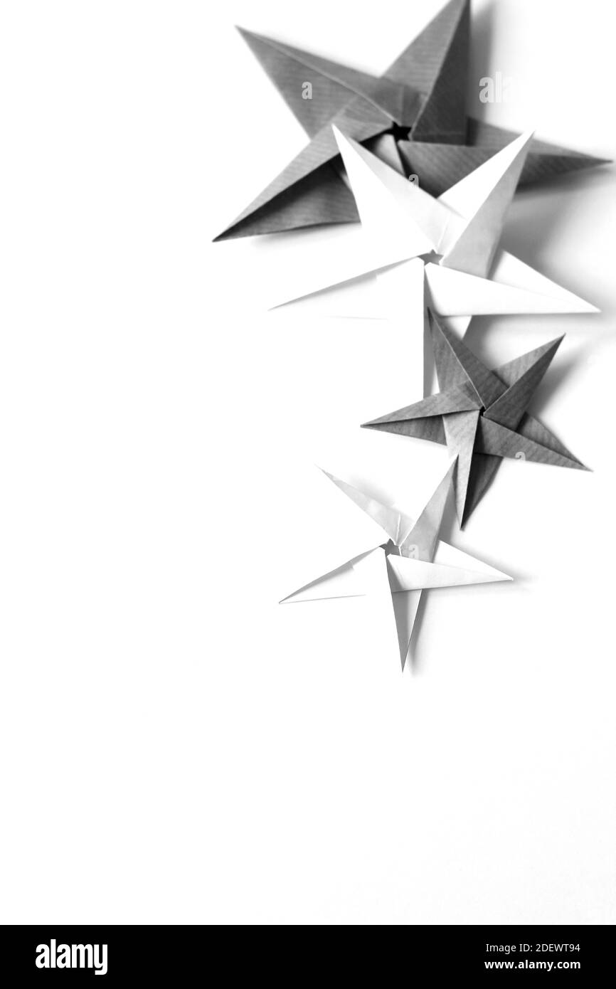 Christmas Origami Stars for Decoration. Minimal Xmas Background. Stock Photo