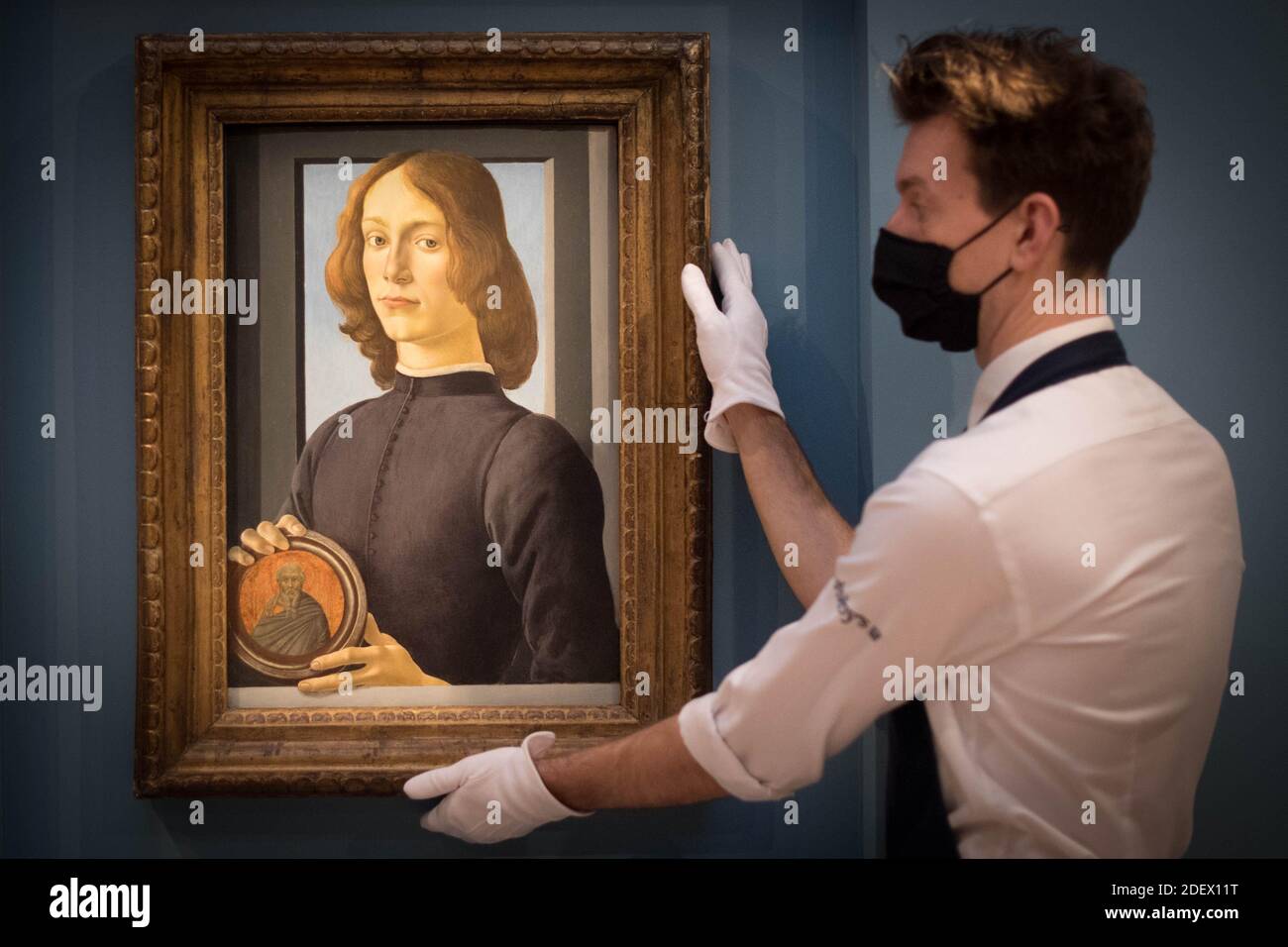 A Sotheby's Gallery Assistant Adjusts One Of Renaissance Master Sandro ...