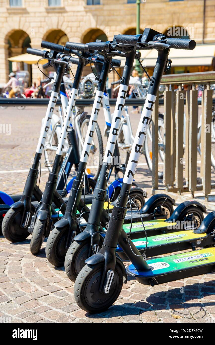 VERONA, ITALY - Nov 21, 2020: Several e-scooters for rent in Verona so that  tourists and visitors can cover distances on the e-scooter and do not have  Stock Photo - Alamy