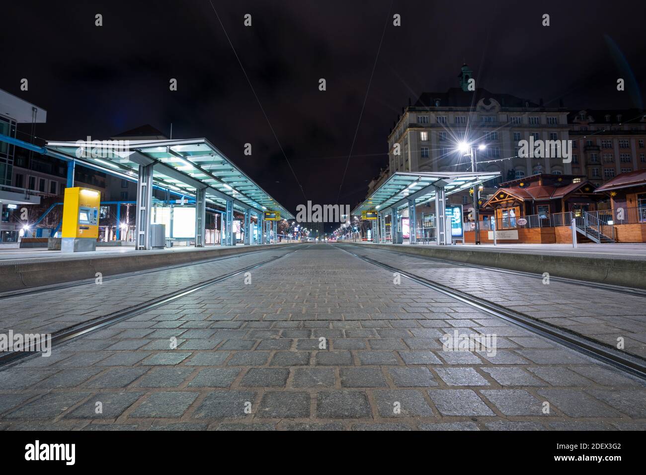 DRESDEN, GERMANY - Nov 21, 2020: DRESDEN, SAXONY/GERMANY - 11 21 2020: Altmarkt tram station is empty during a Friday night due to corona virus lockdo Stock Photo