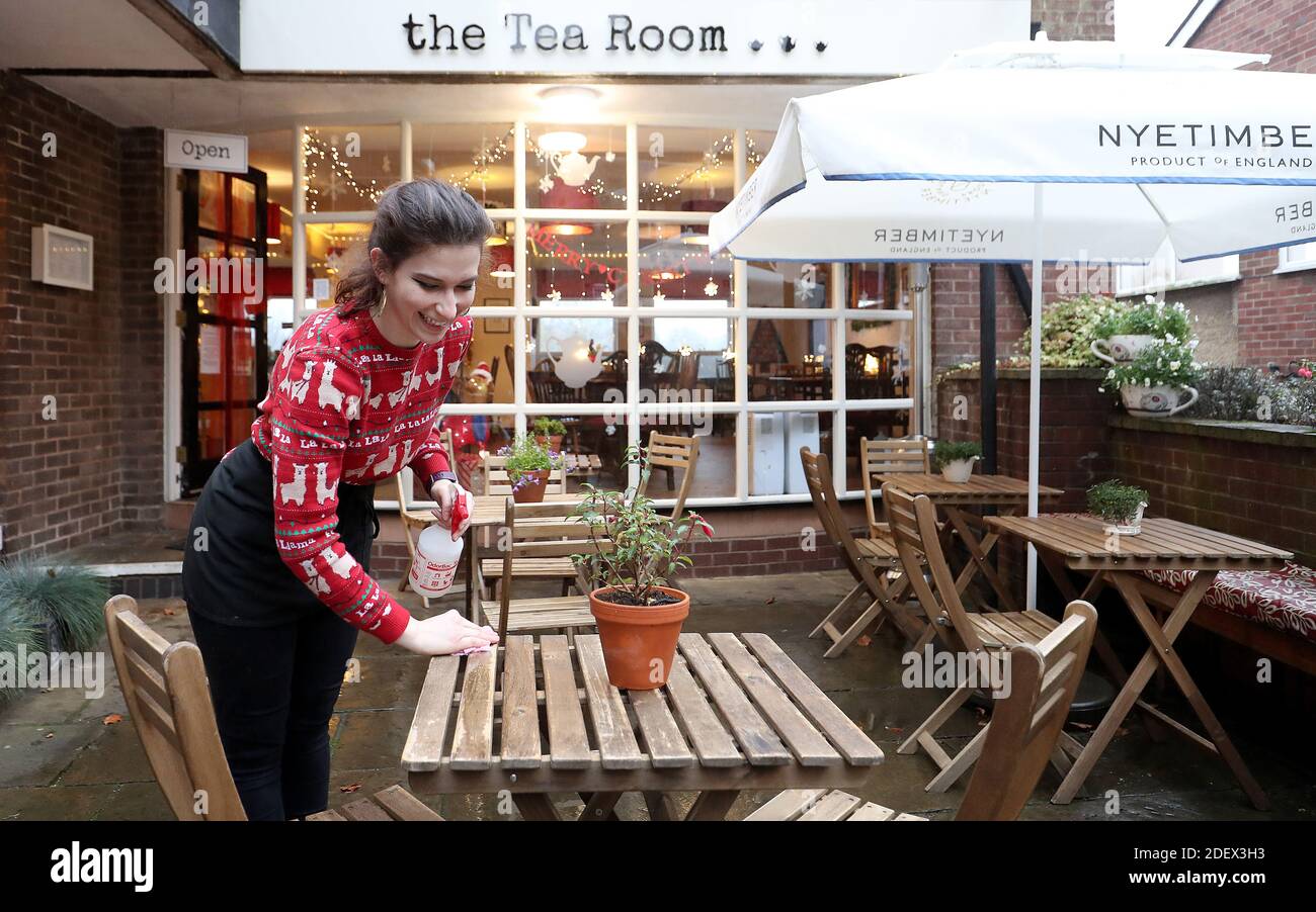 Harriet Henry, manager of The Tea Room in Knutsford, prepares tables