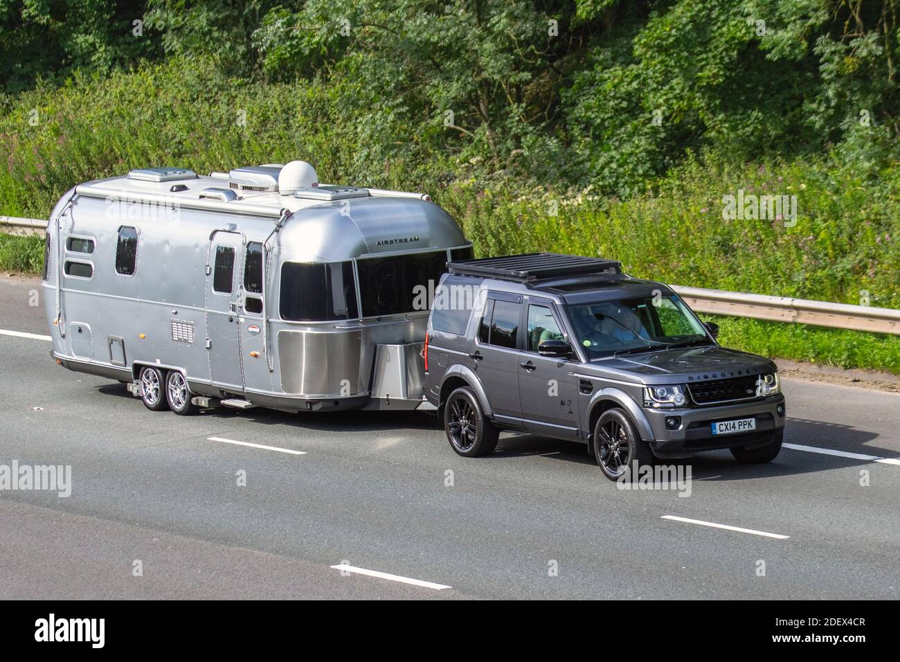Airstream aluminium Caravan Motorhomes towed by Land Rover Discovery