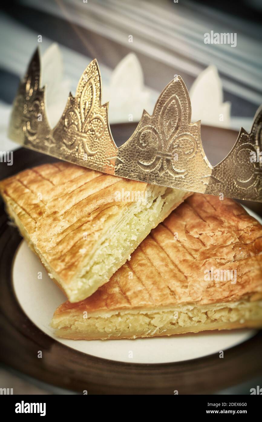 king cake,galette des rois and its crown closeup Stock Photo Alamy