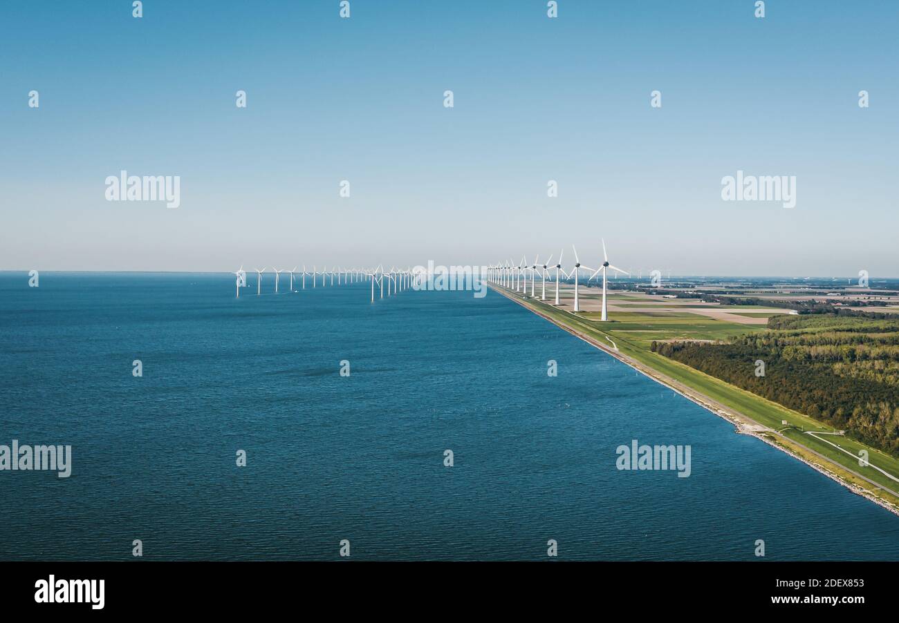 Offshore and near-shore wind farm Windpark Noordoostpolder near Urk, Flevoland, The Netherlands. Aerial view. Stock Photo