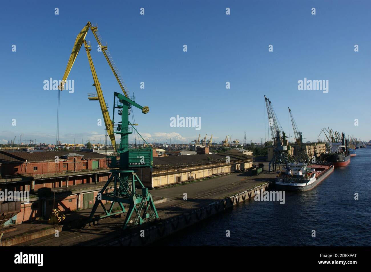 Giants of the great port of St.petersburg span the horizon. Stock Photo