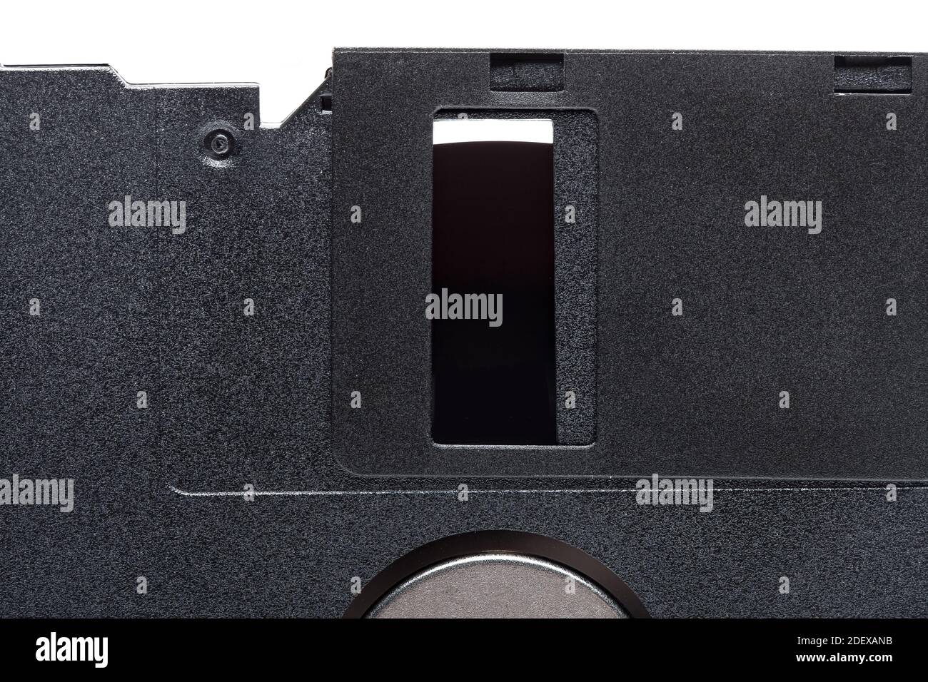 floppy diskette in a black square plastic case with open disk