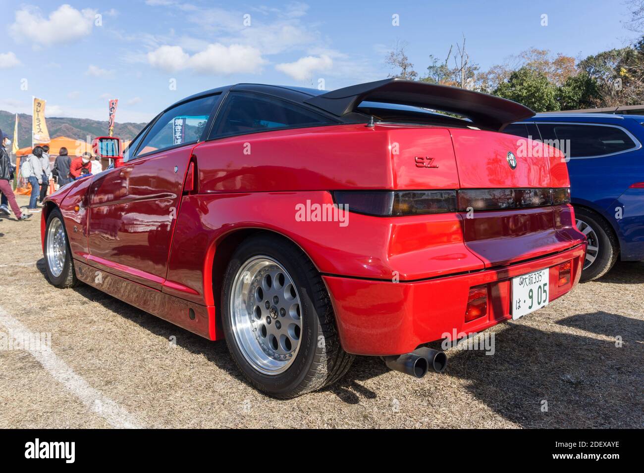 Rear view of a red Alfa Romeo SZ sports coupe outside in sunshine Stock Photo