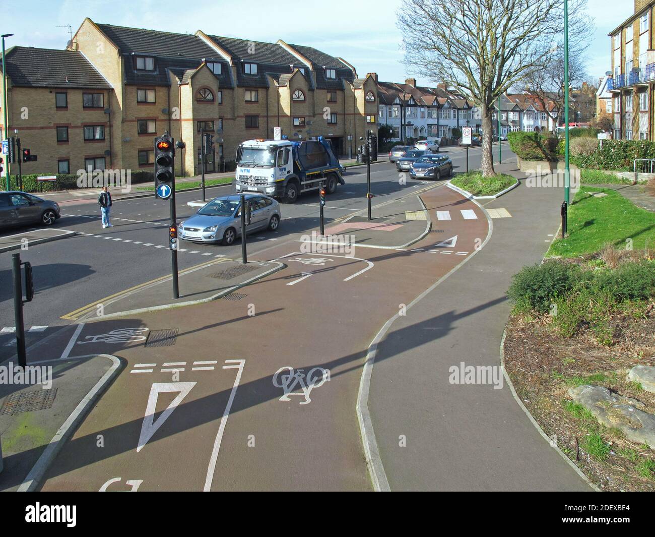 Remodelled road junction with bike lanes; Lea Bridge Road / Wood Street, London, UK. Part of Waltham Forest's 'Mini-Holland' safer streets initiative. Stock Photo