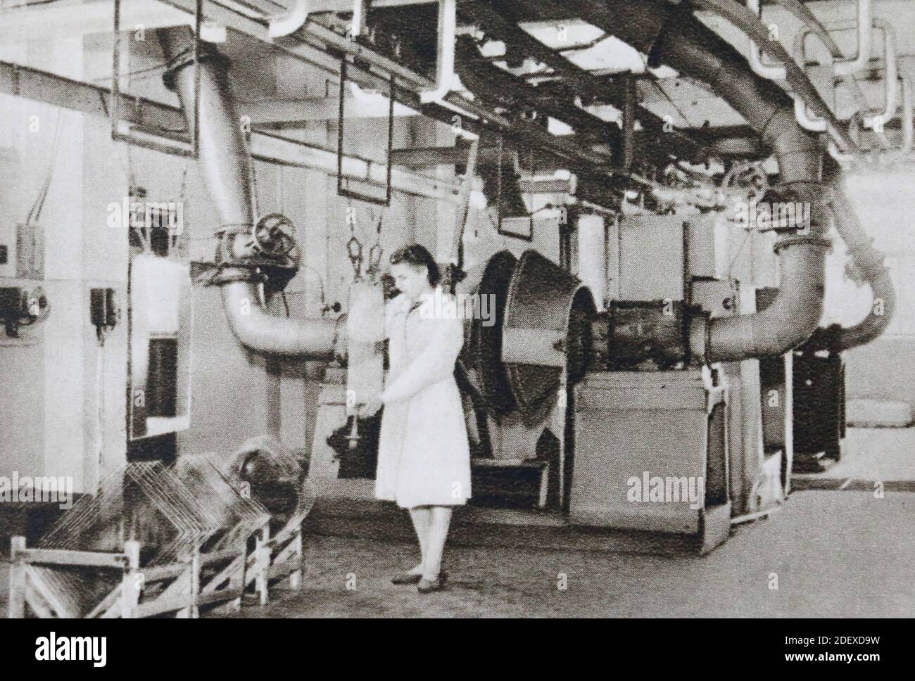 In the workshop for the production of automotive glass Stalinite of the Gorky Glass Factory in the USSR in the 1950s. Stock Photo
