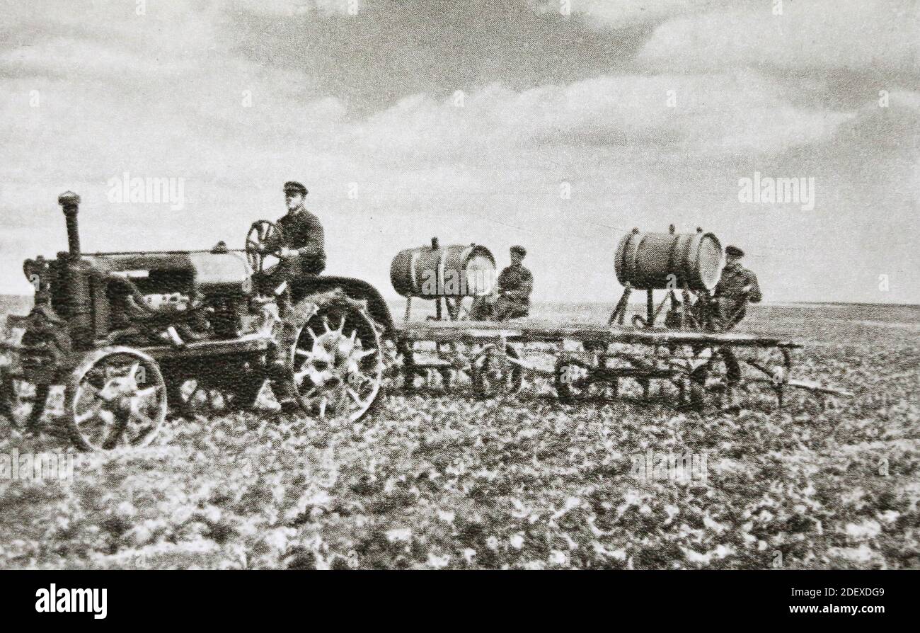 Loosening of row spacings with simultaneous feeding of sugar beet crops in the Petrovsky agricultural cartel in the Vinnitsa region (Ukraine) of the USSR in the 1950s. Stock Photo