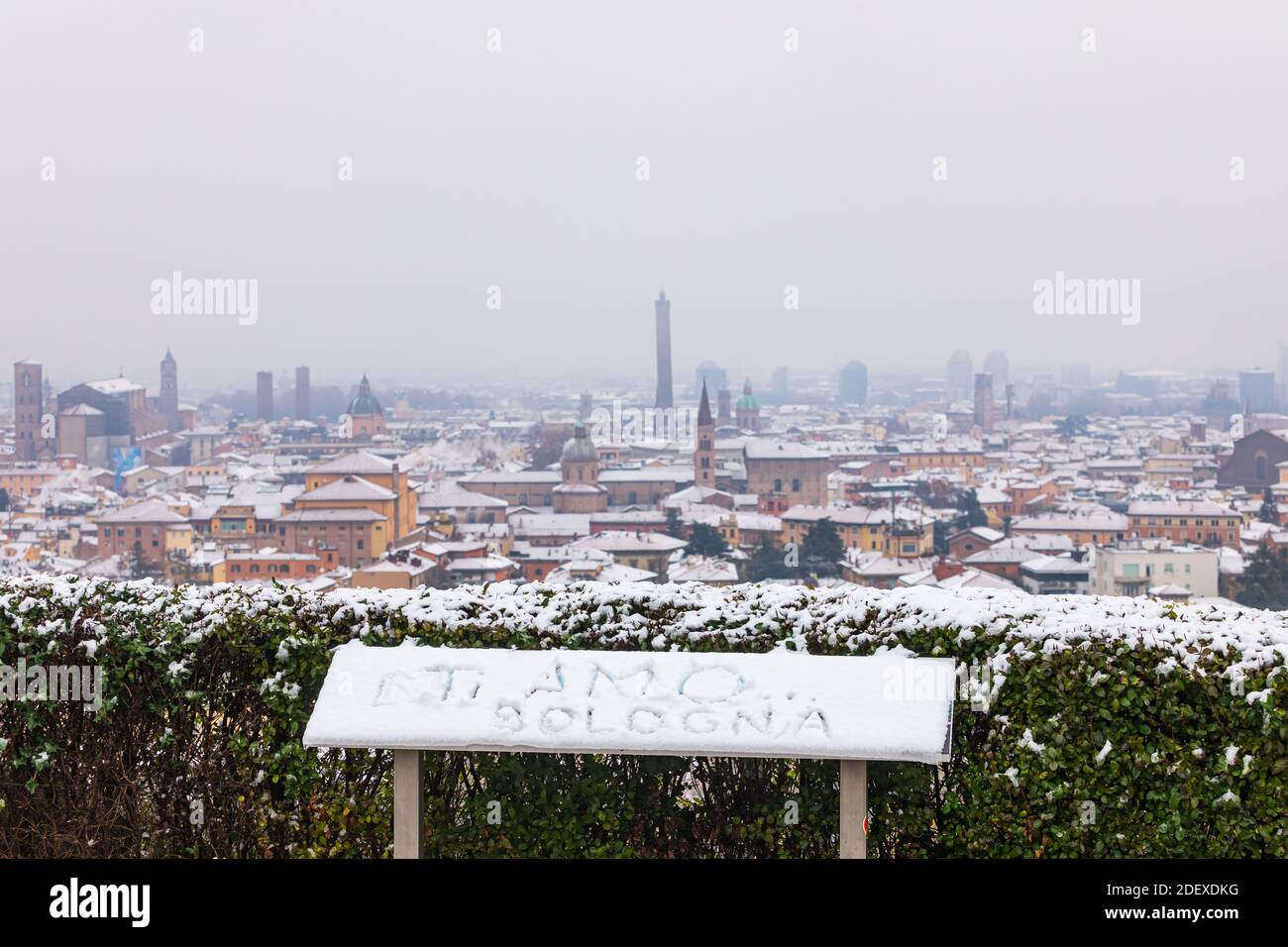 Bologna, Italy. 02nd Dec, 2020. Written on the snow "Ti amo Bologna" (I love you Bologna) with the background of the city in Bologna, Italy on December 02, 2020. First snow in the city: it began to fall early in the morning, whitewashing the roofs. Credit: Massimiliano Donati/Alamy Live News Stock Photo