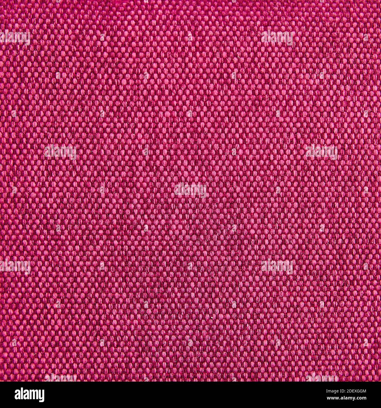 Fabric texture magenta color for background or design Stock Photo - Alamy