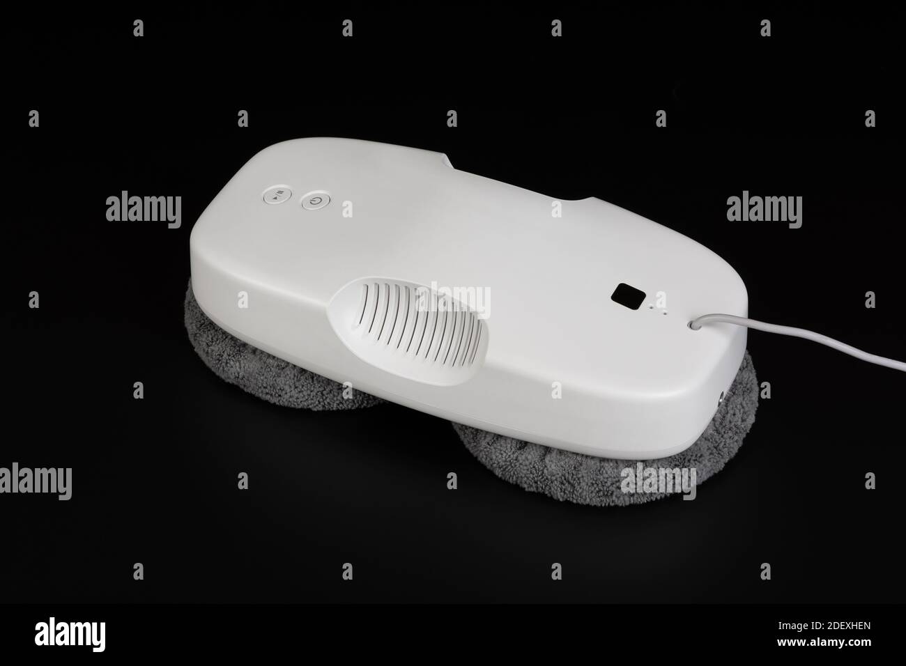 White window cleaning robot on black background. Stock Photo