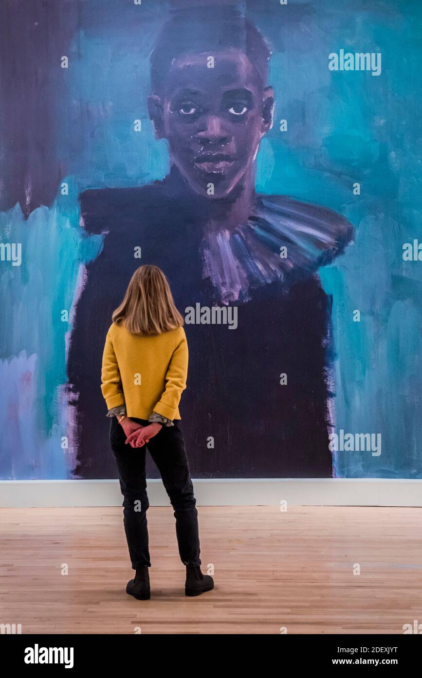 London, UK. 2nd Dec, 2020. A large wall poster of A Passion Like no Other, 2012 - Lynette Yiadom-Boakye: Fly In League With The Night at the Tate Britain, as galleries re-open after the second coronavirus lockdown. The first major UK survey exhibition of the British artist brings together over 70 works by one of the most important figurative painters working today, spanning two decades and showcasing their unique ability to concoct human subjects from a composite archive of found images and her own imagination. Credit: Guy Bell/Alamy Live News Stock Photo
