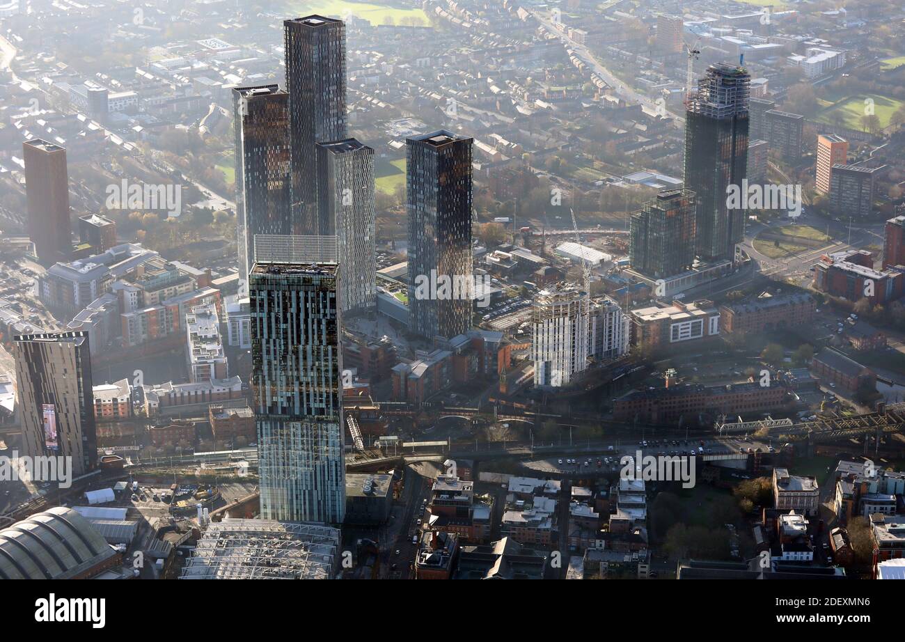 aerial view of the Manchester city centre skyline looking into mist with Beetham Tower in the foreground, UK Stock Photo
