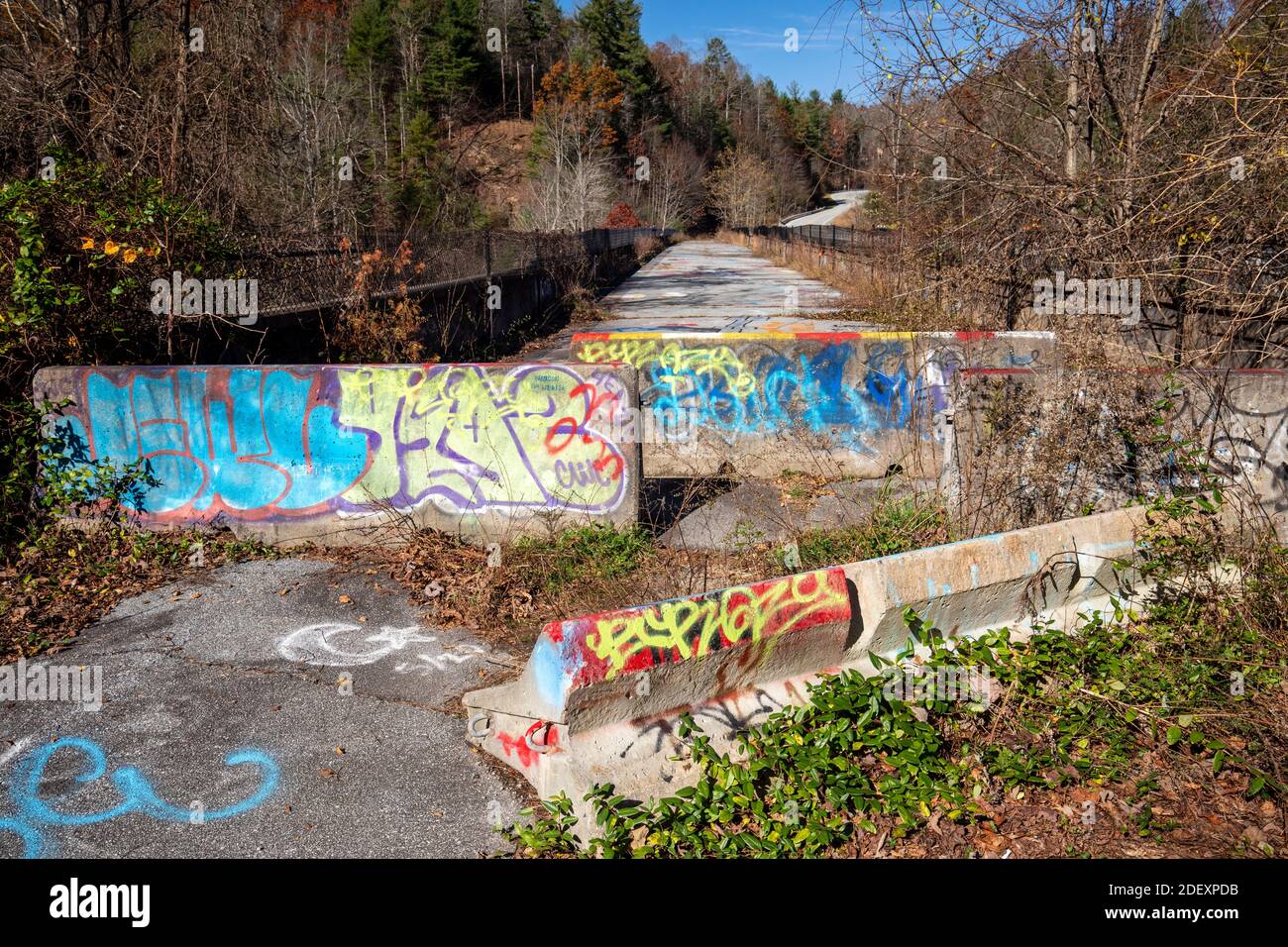 Graffiti and barricades on top of High Bridge or Green River Bridge between Flat Rock and Saluda, North Carolina, USA Stock Photo