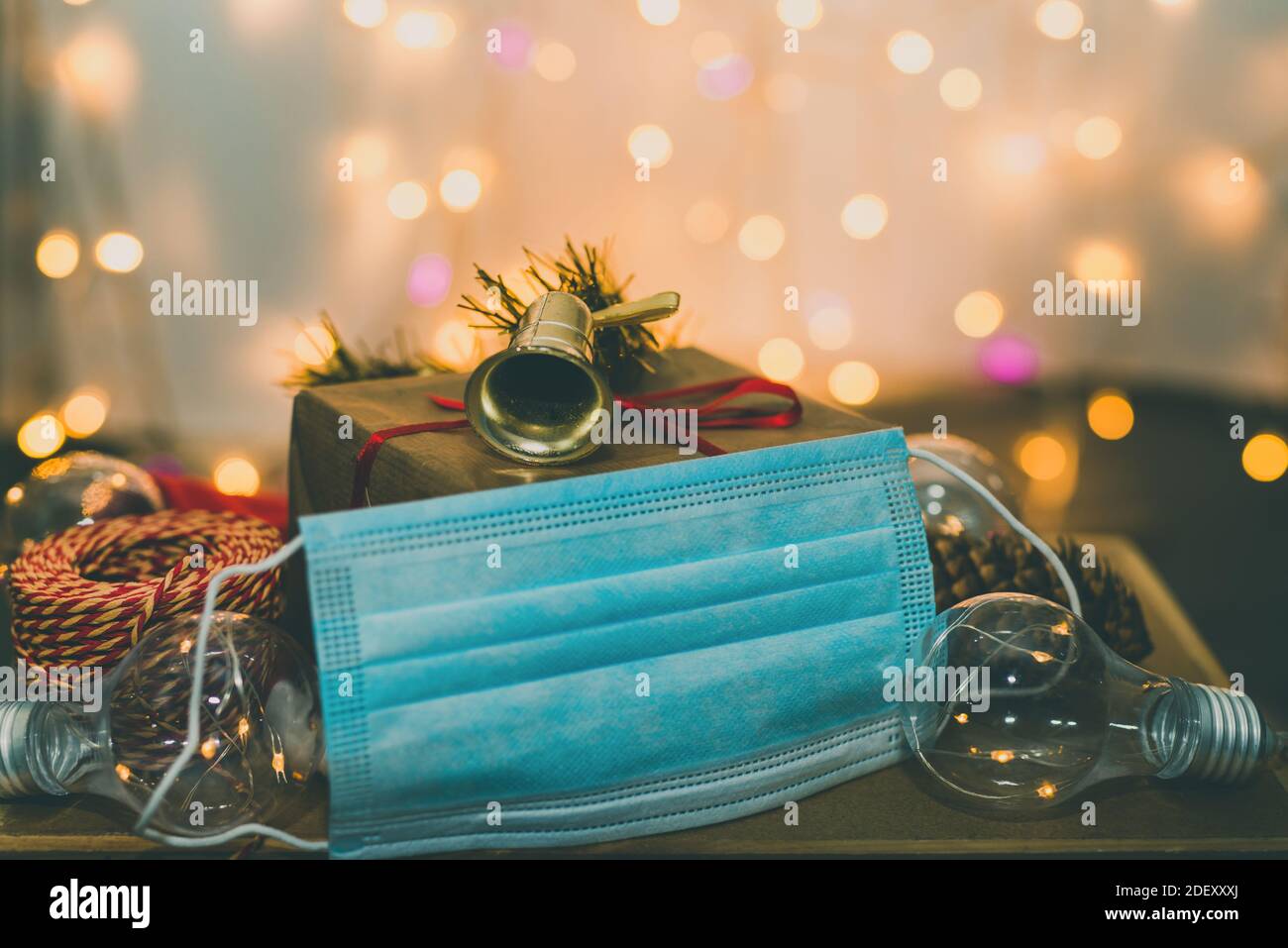 Christmas and New Year gift box with face mask decorated with Christmas garlands Stock Photo Alamy