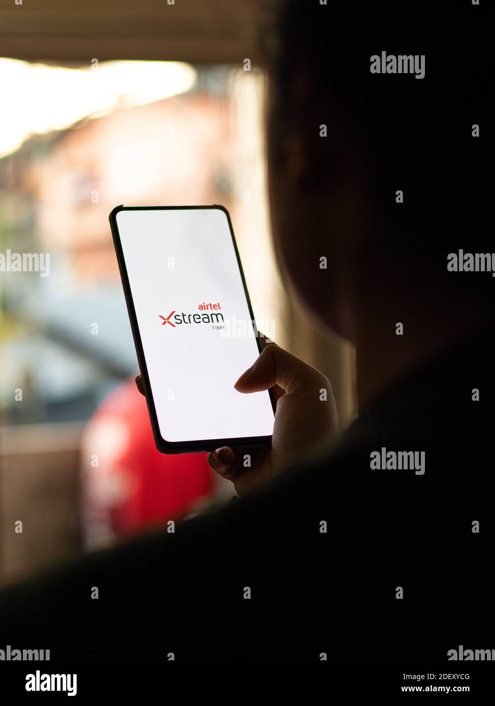 Assam, india - November 29, 2020 : Airtel xstream logo on phone screen stock image. Stock Photo