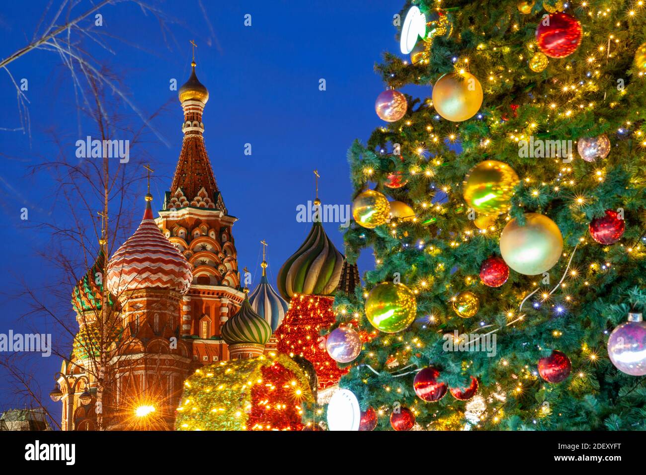 Christmas Tree on the Red Square with the Saint Basil's Cathedral on the background, Moscow, Russia Stock Photo